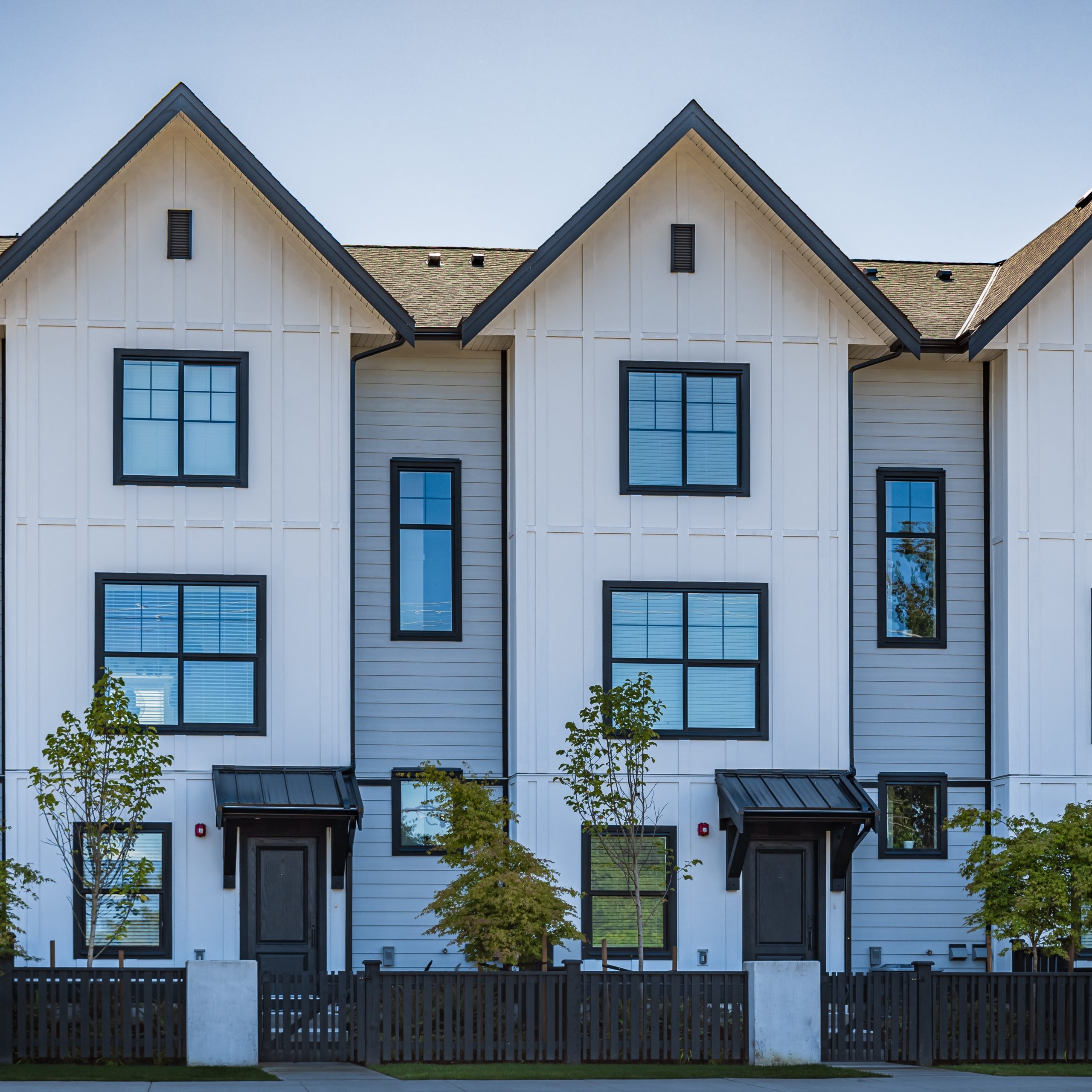 A small, modern apartment complex is shown as example of a teacher housing project that could be funded by the State of New Mexico in rural areas. 